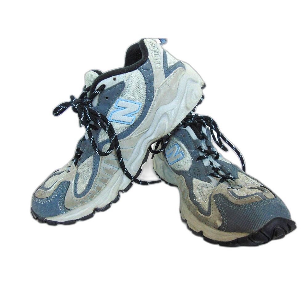 Men's New Balance Shoes Size 8.5 B gray with blue trim terrain trail shoes.